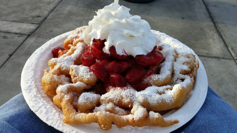 A fun twist on the funnel cake - a strawberry shortcake funnel cake! 